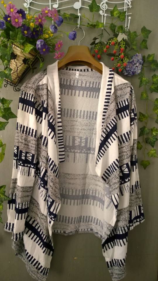 Ebay European autumn warm women's coat Spelling Color Irregular Long Sleeve Sweater Cardigan