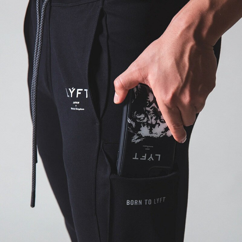 Herre lomme joggingbukser mænd fitness fitness fitness bukser man bomuld jogging sportsbukser plus size træningstøj: M / Sort