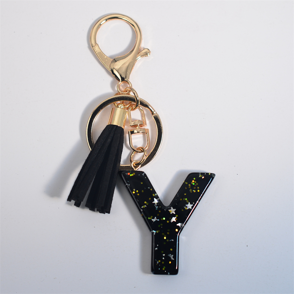 Schwarze Initialen A-Z Schlüsselanhänger Glitzer Stern Pailletten Harz Buchstaben Schlüsselanhänger mit Quaste für Frauen Tasche Ornamente Charm Autoschlüsselhalter