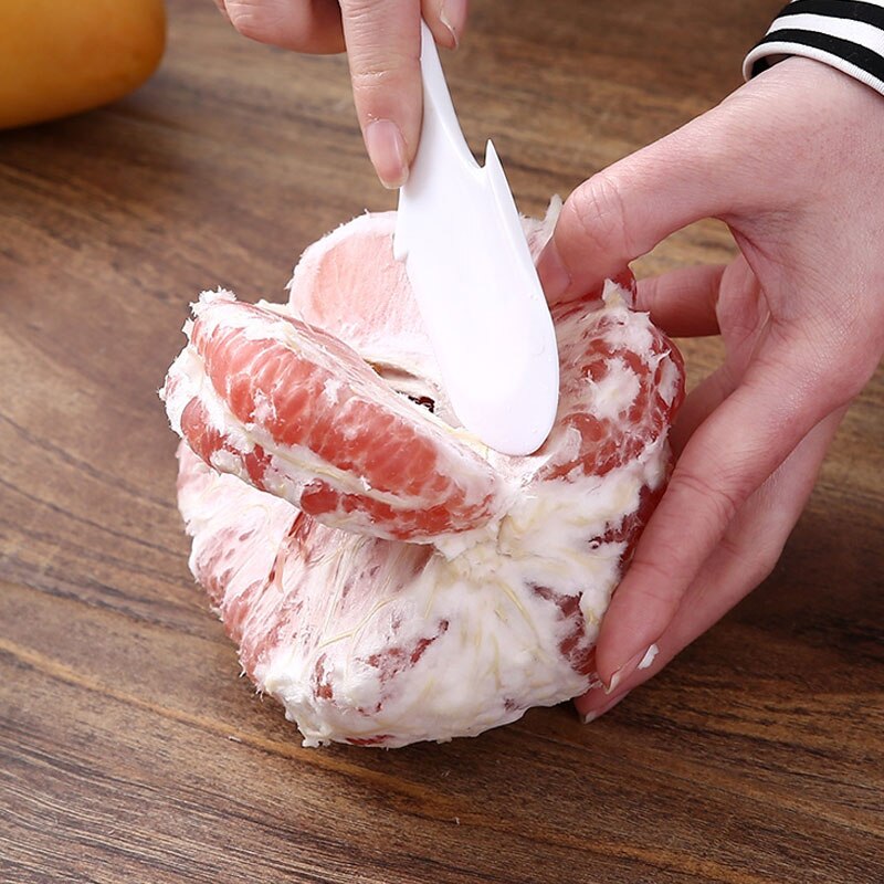 Outil pour peler et enlever rapidement la peau de pamplemousse