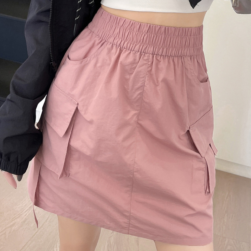 Amerikaanse hoge taille korte cargo rokken voor dames, zomerse stijlvolle rok met grote zakken, sneldrogende sportieve rok, eenvoudige effen a-lijn rok.