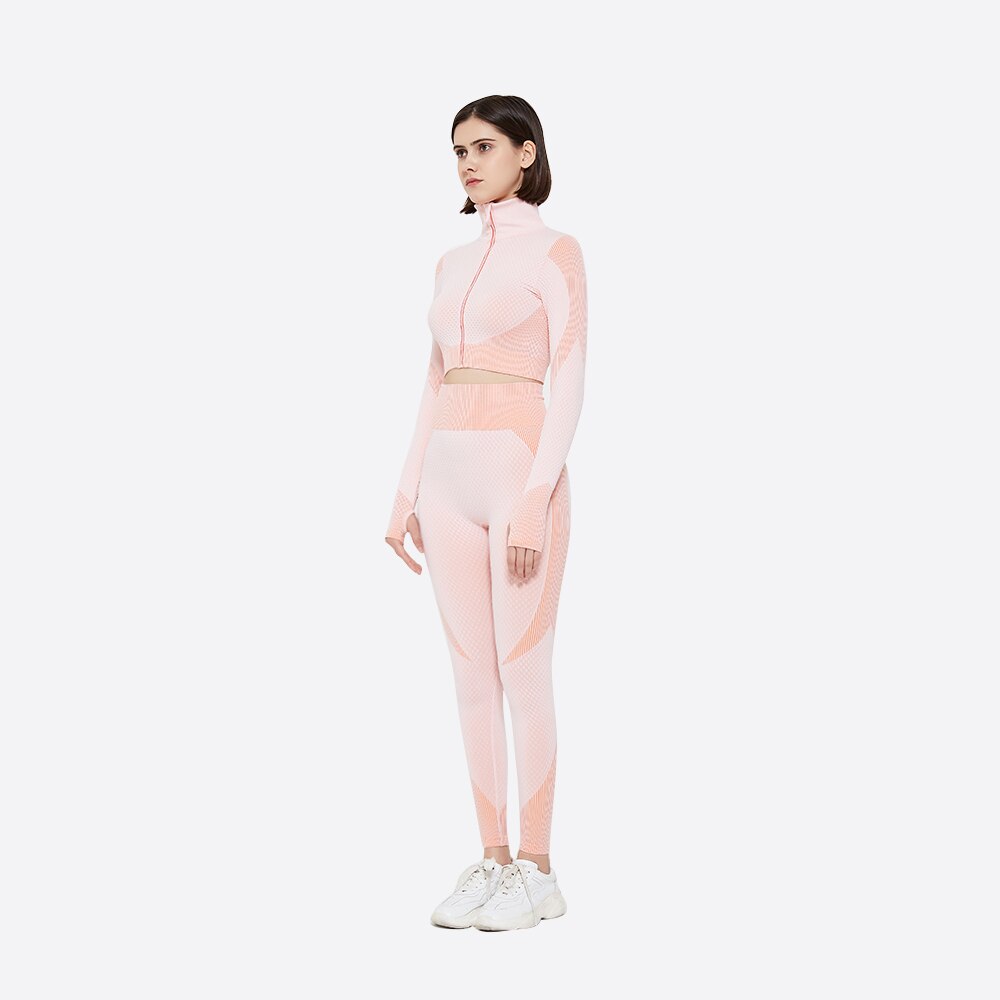 Avskuren långärmad träningstopp och leggings med hög midja i rosa