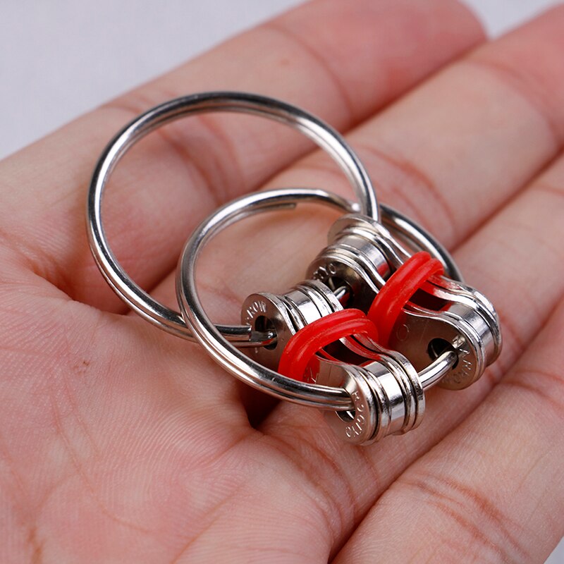 Giocattolo Mano filatore Anello Chiave Sensoriale Giocattoli Alleviare Lo fatica Umore