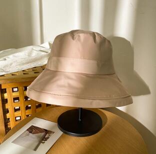 Koreansk sol hat spand hat caps kvinder sommer strand hat solskærm vandtæt regn hat til mænd damer: Farve 1