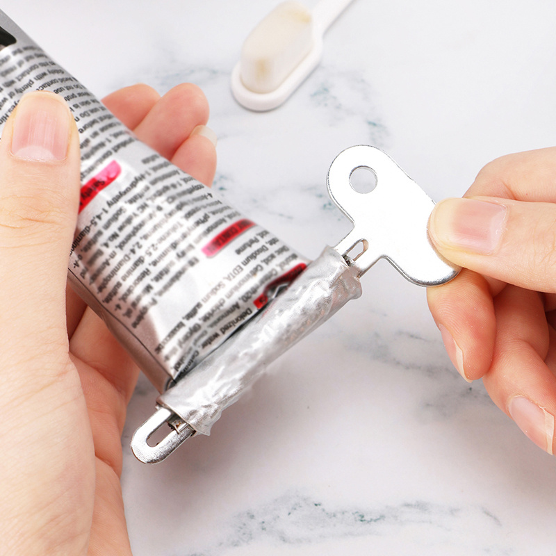 Spremi dentifricio in acciaio inossidabile, spremiagrumi per capelli, vernice ad olio, dispenser rotante per unguenti, cosmetici, accessori da bagno