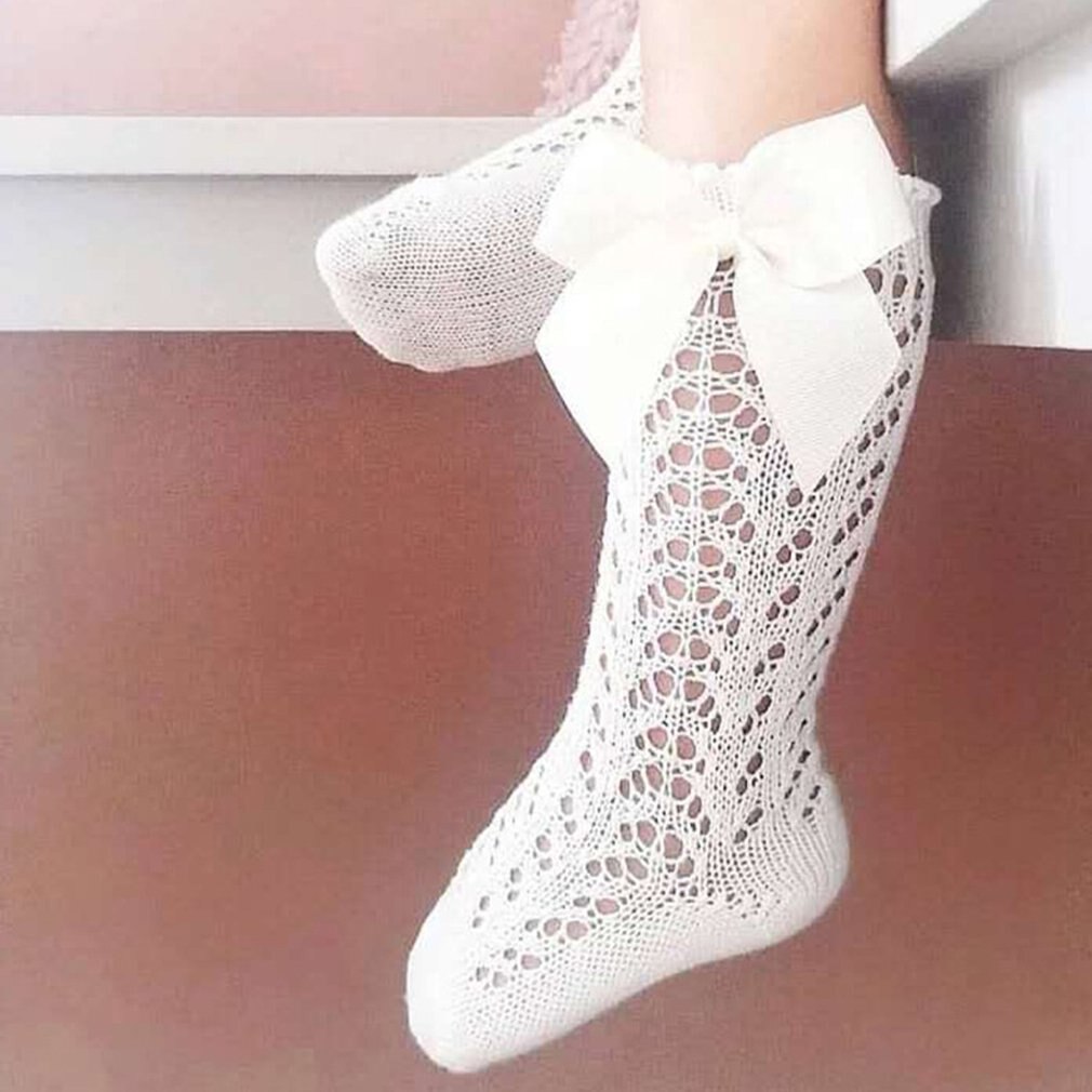 Peúgas infantis com arco crianças verão meninas joelho longo meias altas algodão macio oco para fora crianças malha princesa meias para 0-2 anos