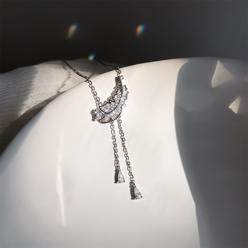 ANENJERY-collar de plumas de circonia cúbica brillante para mujer, Color plateado, collar de borla larga y delicada, S-N732