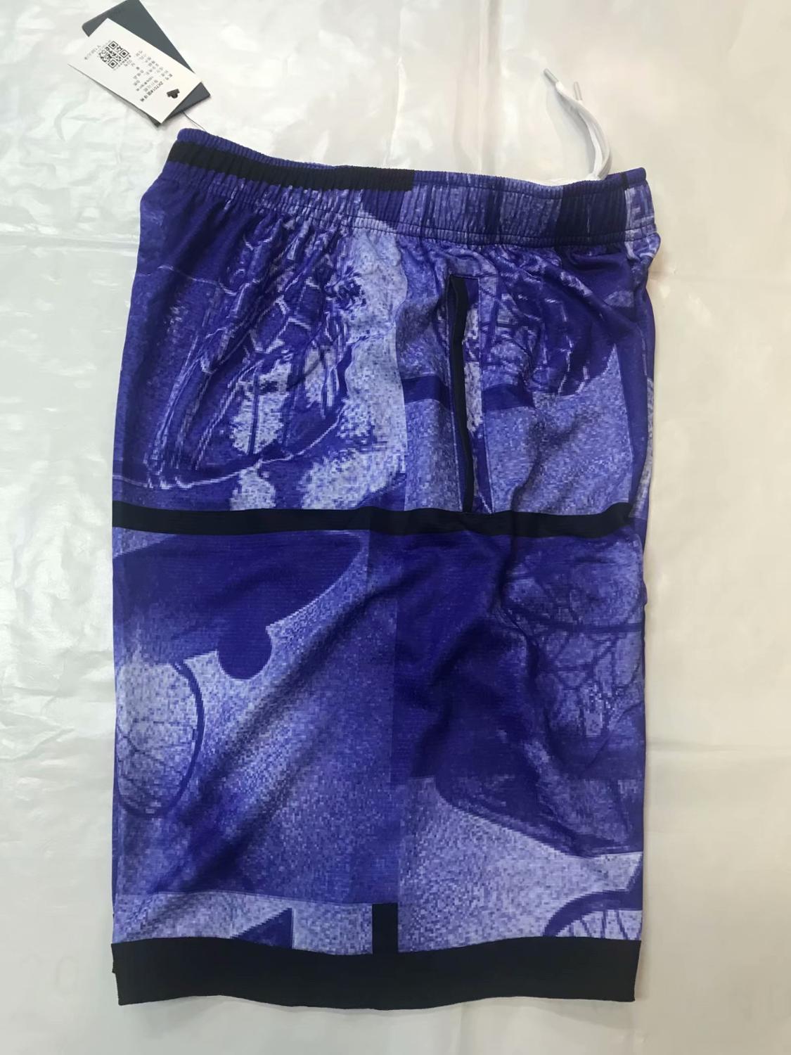 Basketballshorts pustende sport løpeshorts utendørs sport Fitness korte bukser løs strandshorts glidelåslomme
