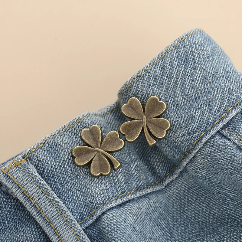 Botón de cintura con lazo para apretar, hebilla de cintura ajustable en forma de estrella y flor, sin costura, broche para pantalones, alfileres de fijación para pantalones vaqueros reutilizables: Verde esmeralda / NONE
