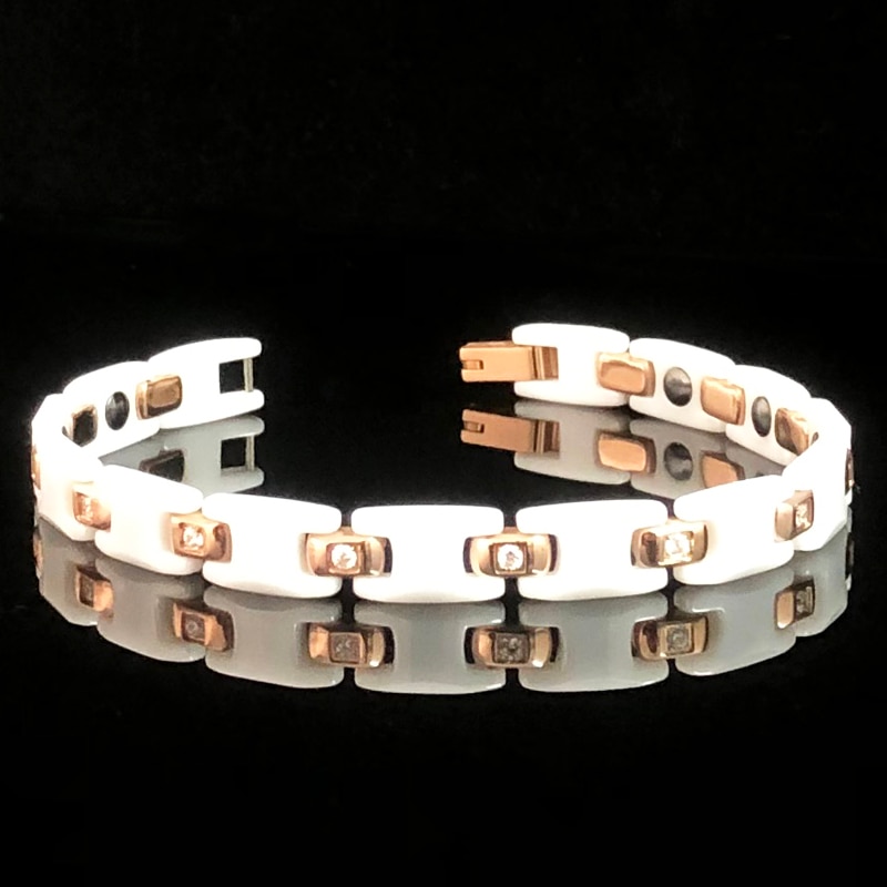 Schönes weißes keramik-paararmband mit magnetverschluss für damen und herren.