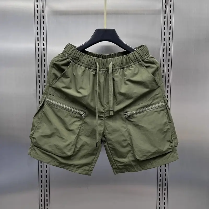 Højtaljede cargoshorts til kvinder sommer tynde, løse, hurtigttørrende shorts med brede ben, koreanske, solide sportsshorts med snøre: L / Beige