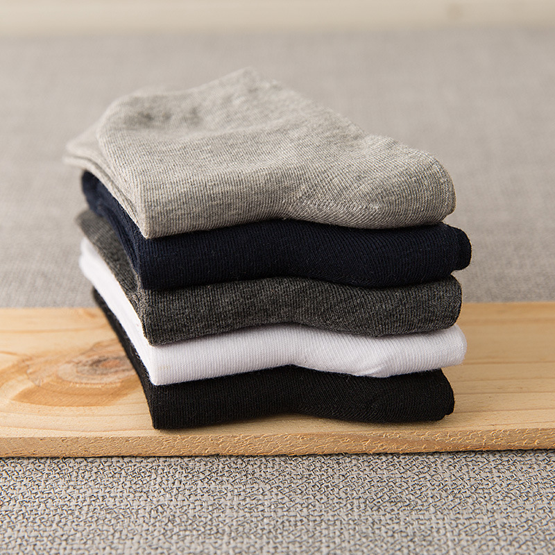 5 pares de calcetines de algodón de tubo medio de color sólido blanco y negro para mujer