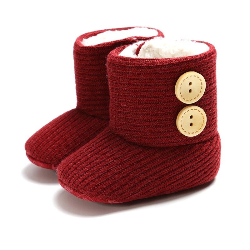 Baby warme winterlaarzen meisjes zachte zool wieg schoenen knoop katoenen platte laarzen gebreide effen knopen peuterschoen