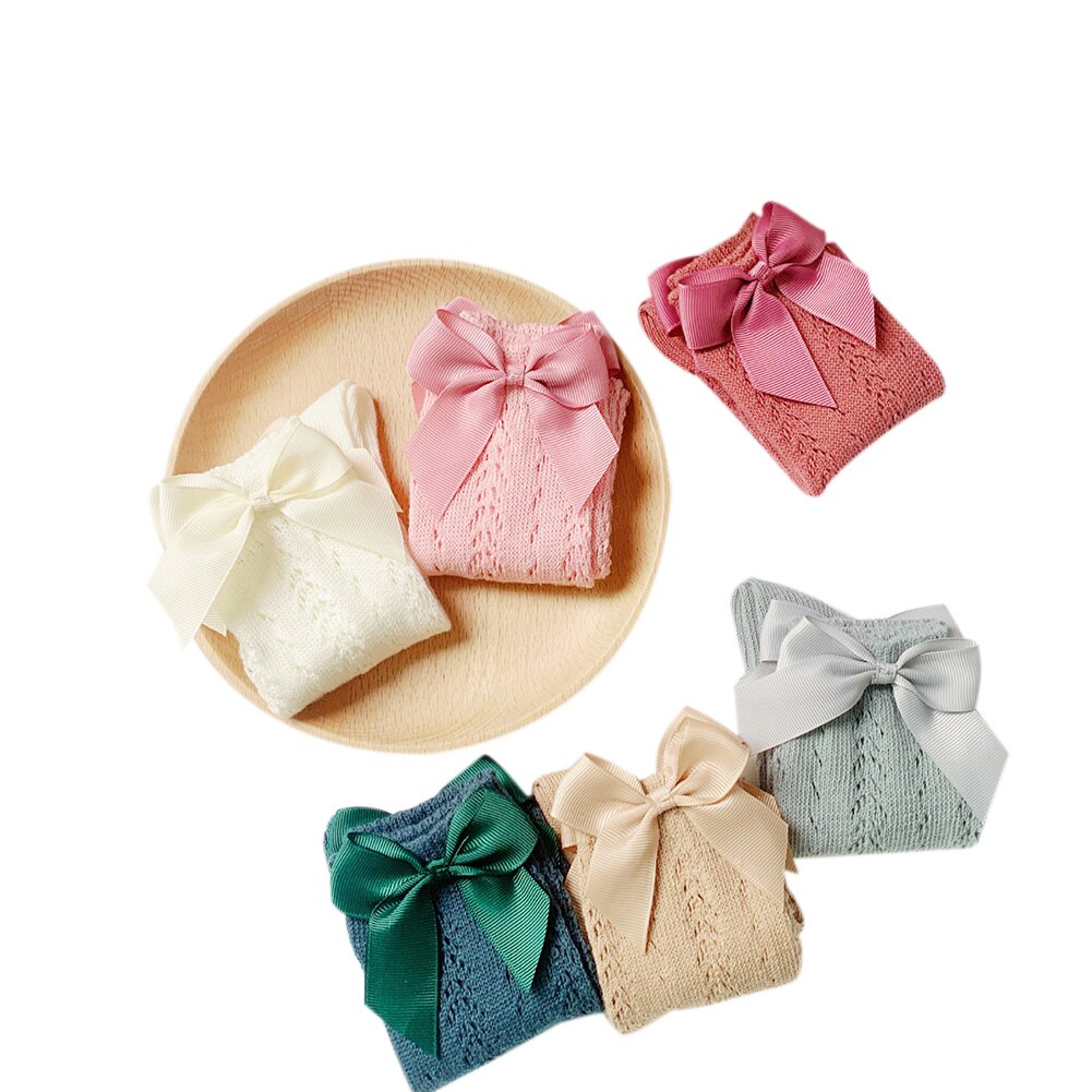 Ademende meisjes mesh kousen herfst kinderen zoete stijl effen kleur strik decoratie holle sokken tot halverwege de kuit