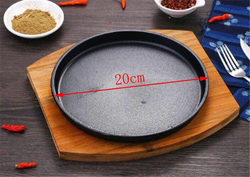 Bandeja redonda de hierro fundido para asar carne, olla de esmalte para freír, soporte de Base de madera, utensilios de cocina, plato para hornear: 20x H2cm