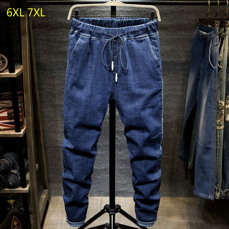 Salopette en jean homme personnalité masculine noir denim étudiant sarouel élastique stretch pieds minces pantalon Super grande taille 7XL 6XL