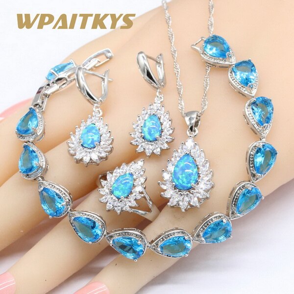 Conjuntos de joyas de boda de color plata con ópalo azul pera para mujer, collar, colgante, pendientes, anillos, pulseras de cristal azul cielo: 4 piezas / 9