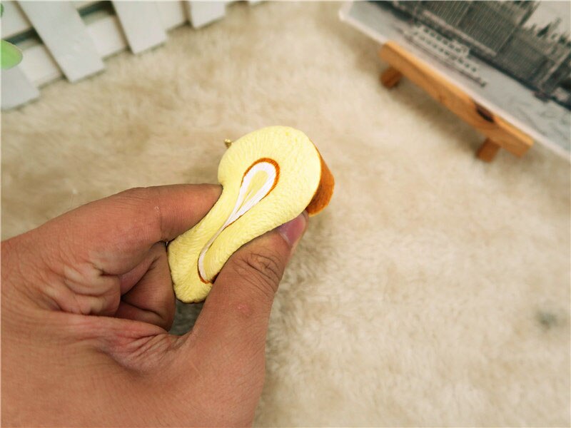 Kuutti Squishy juguete antiestrés Kawaii lindo rollo suizo pan de la torta blandita lento aumento de Jumbo Chocolate Rosa Amarillo Blanco Squishies