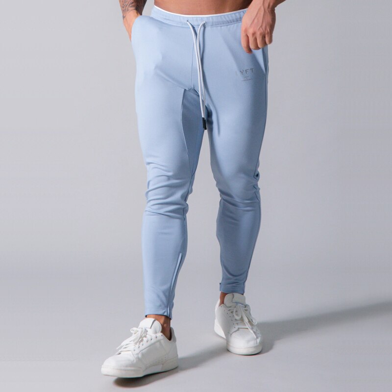Pants men's jogging fitness track pants men's Korean casual slim hit color jogging trousers