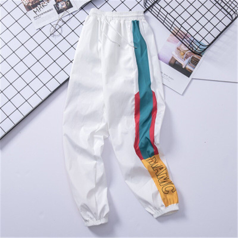 Ropa informal estilo Hip Hop para hombre, pantalones de chándal de empalme, pantalones casuales de para hombre, pantalones Cargo, pantalones de calle alta, pantalones Harem de cintura elástica para hombres