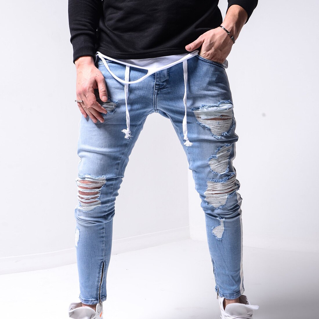 Pantalones pitillo rasgados para Hombre, pantalones vaqueros ajustados con rayas laterales para motociclista, pantalones vaqueros rasgados con agujeros estilo Hip Hop para Hombre