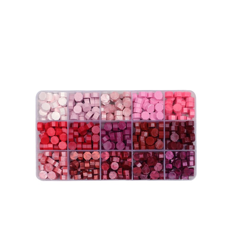Perline di ceralacca colorate che mescolano i mestieri di colore per il sigillo di cera del bollo della cartolina di nozze della busta: O