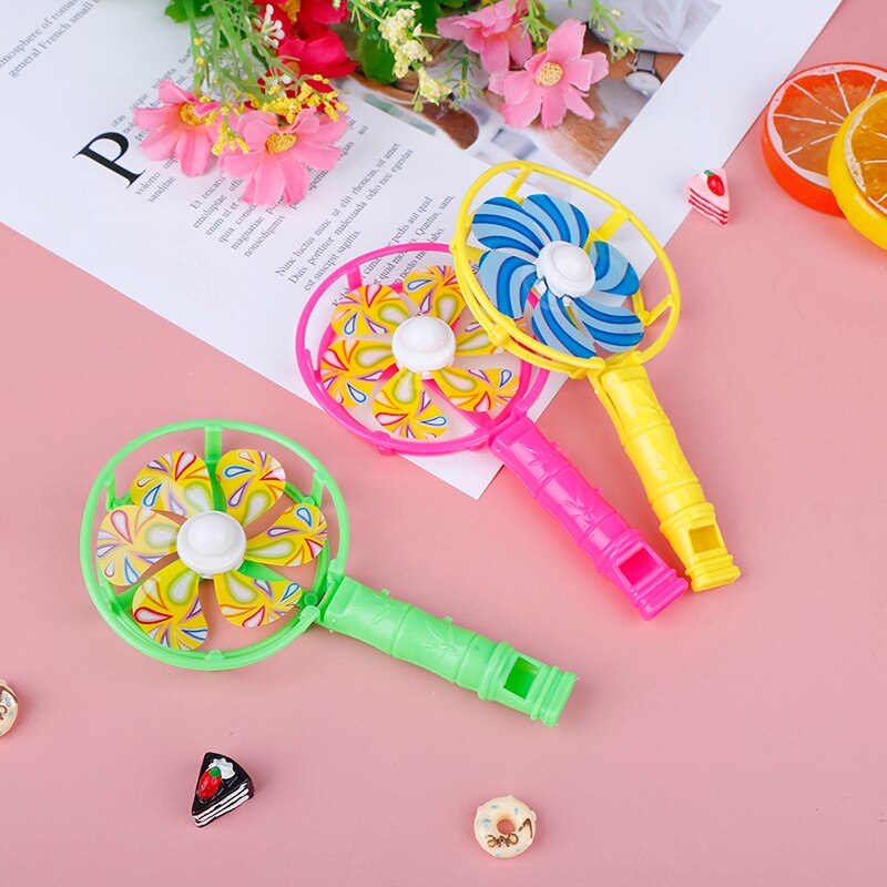 Molino de viento de plástico para bebés y niños, juguete infantil de molino de viento pequeño colorido, con mango silbante