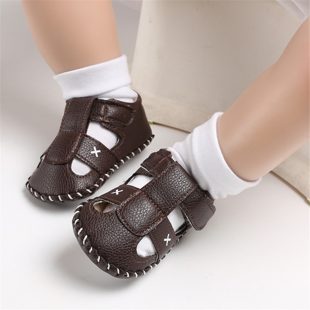 0-12M sandali per neonato estate PU scava fuori scarpe da passeggio traspiranti per bambini calzature piatte con suola morbida antiscivolo