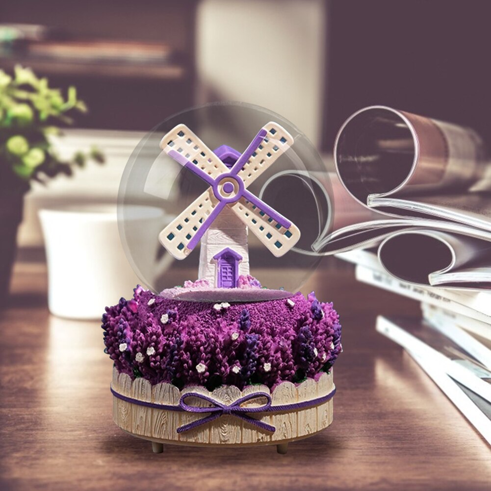 Nieve cayendo nieve caja de música de molino de viento caja de música con forma de bola de cristal con púrpura lavanda Base de escritorio decoración
