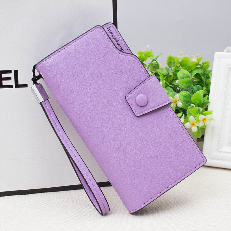 Multi-functional lady's purse with long zipper clasp and handbag in lady's candy color: violet