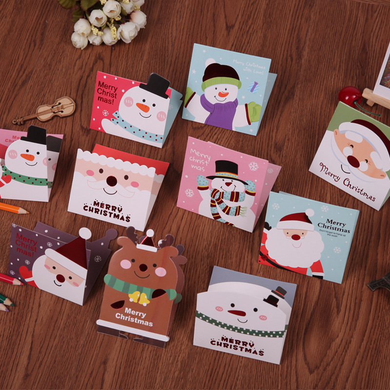 8 stks/partij Mini Cartoon Kerst Wenskaarten Bericht Postkaart met Envelop Willekeurige Patroon DV008