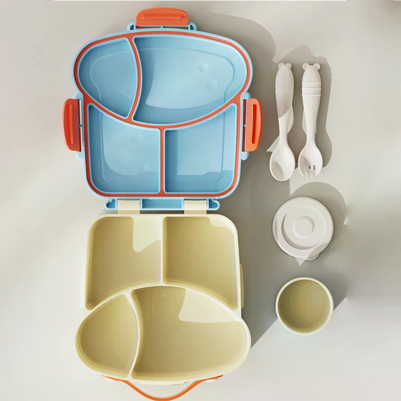 Uroczy plastikowy pojemnik na obiad z przegródkami, kreskówkowy pojemnik na jedzenie z pokrywkami, przenośny lunchbox bento dla uczniów i pracowników biurowych.
