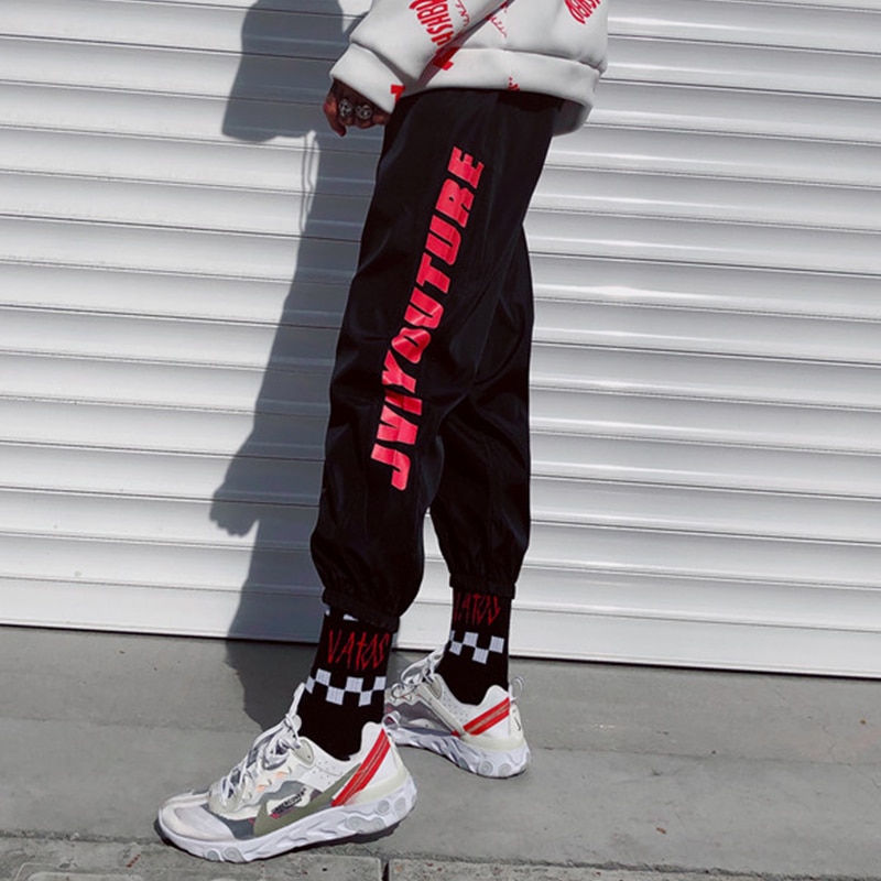 Höhe Hüfte hüpfen Hosen Männer verlieren Pluderhosen Jogger Hosen lässig Schweiß Tragen Männliche