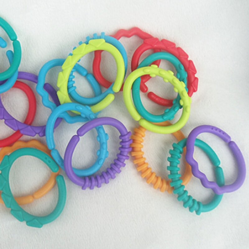 8 pcs Baby Teether toddler toys Rubber Rainbow Ring Safety Molars Rattle Colorful crib mobile Decoration Stroller Hanging
