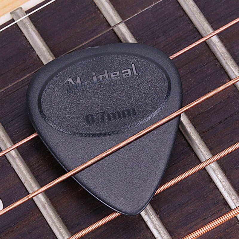 10 Uds púas de Guitarra antideslizantes, púas negras de 0,7mm de espesor, accesorios duraderos para Guitarra eléctrica, bajo, Guitarra eléctrica, ukelele