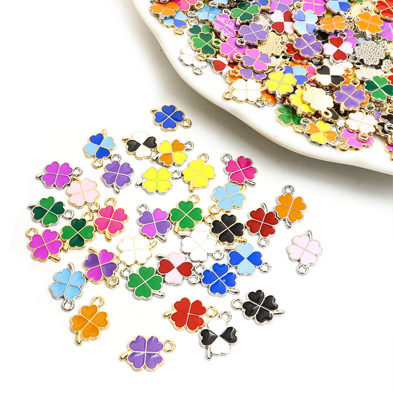 Dopamina trébol de cuatro hojas esmalte encantos 20 piezas DIY collar pulsera pendientes llavero amuleto colgantes accesorios de creativos