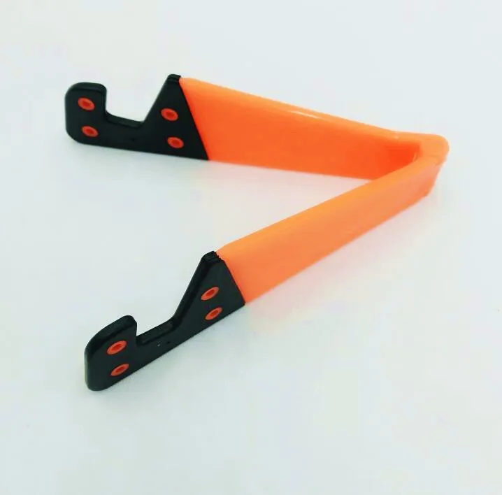 Foldable V Shape Cellphone Stand Holder Mobile Tablet Adjustable Desk Support Holder Rack Cellphone Tabletop Holder: Orange