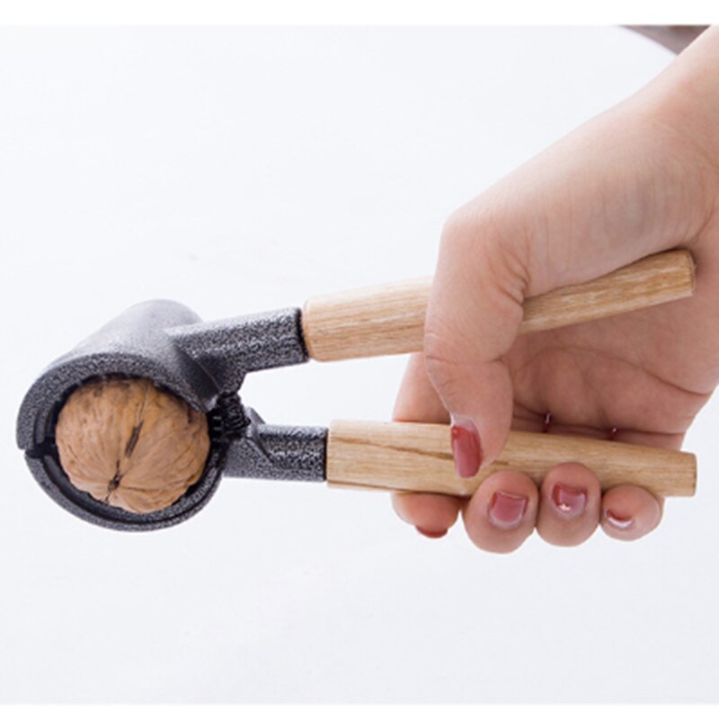 Notenkraker, schiller, amandel, walnoot, pecannoot, hazelnoot, hazelnoot, keuken, notenschiller, clip, gereedschap, klem, tang, cracker