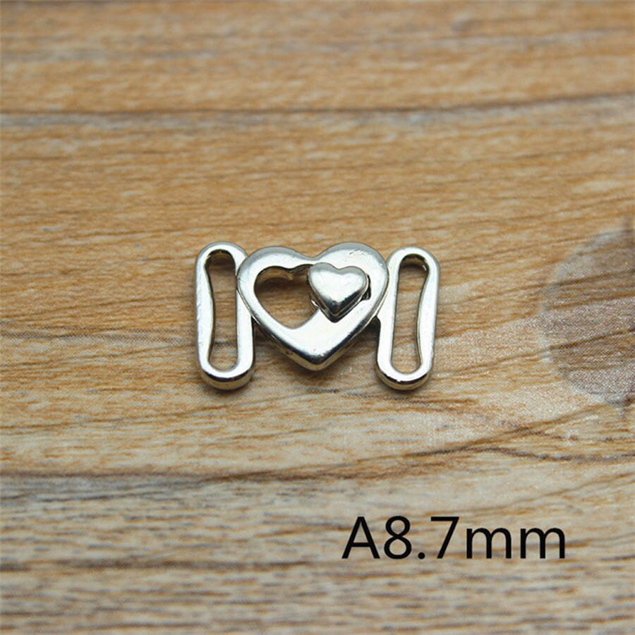 10 set legering bh klämma spännen badkläder clickers bikini front stängning spänne dekoration: A