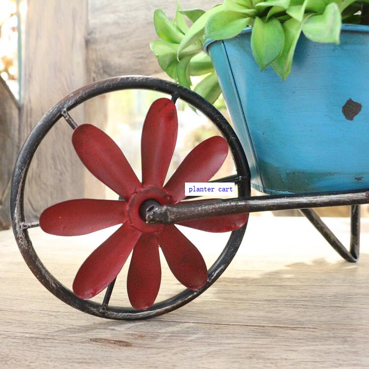 small handcrafted rustic retro metal planter cart