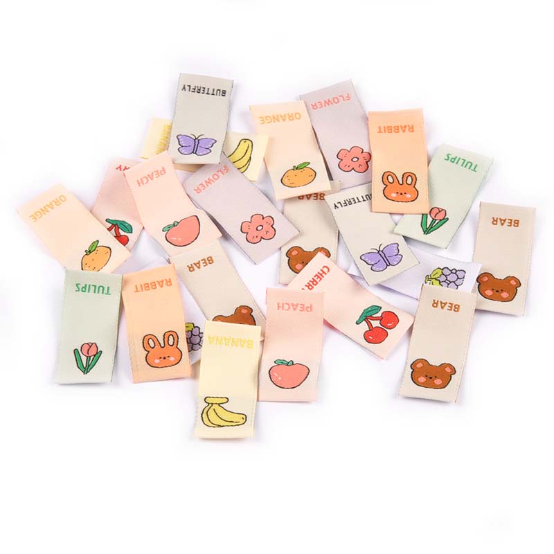 Etiquetas bordadas para el cuidado de la ropa de los niños, accesorios de ropa hechos a mano, manualidades, 40x15mm, 50 Uds.