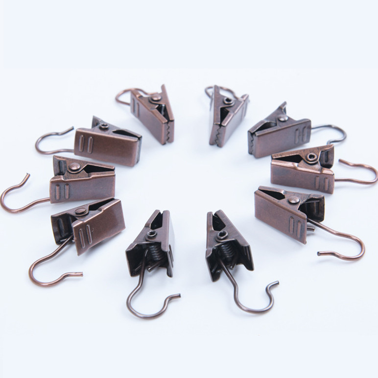 Xzjja 20 stk robuste slidstærke metalgardinclips brusekroge stue gardintilbehør klemmer drapericlips ringeholder: Brune bronze clips