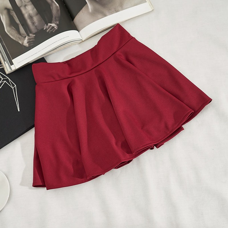 Falda con textura de cintura elástica negra, faldas acampanadas de corte A, falda minimalista corta de cintura alta de otoño para mujer, nueva ropa de talla vintage