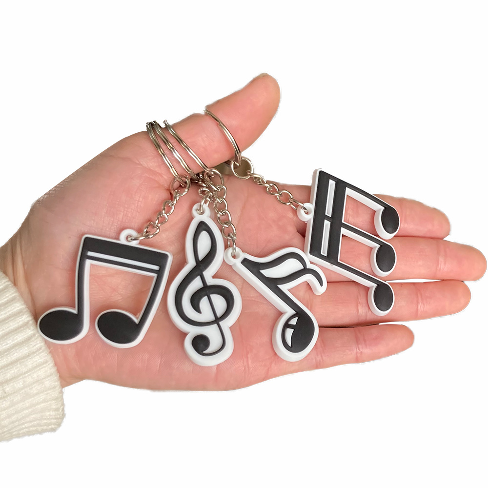 12Pcs Music Party Favors Silicone Music Keychain Musical Note Keychain Roll Themed Keychains 80s 90s Music Themed Party Supplies
