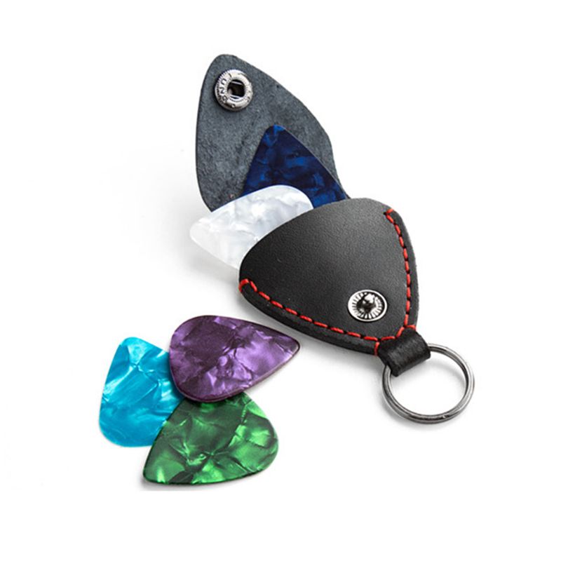 1 pieza de cuero de púa de guitarra eléctrica titular Folk Pop guitarra carcasa de plectro bolsa llavero de Color al azar
