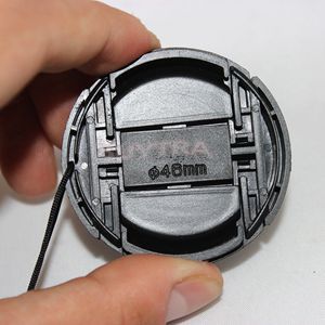 Jetting billig 46mm universal digitalt slr kamera objektivdæksel holder med anti-tab snor spænde holder