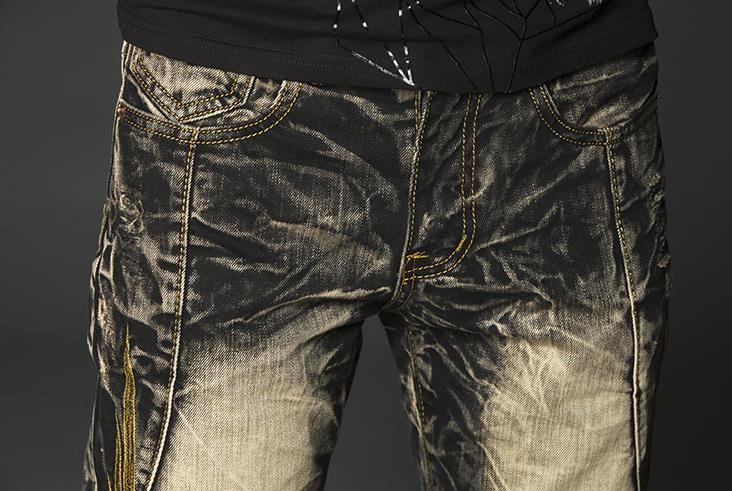 Herr svart rock hip hop jeans nitar broderi guld vingar byxor europa och amerika street vintage slitna raka jeans
