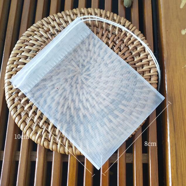 100 st/lot tom tepåse nylonmaterial tepåsar med snöre läka tätning filterpåse papper för ört löst te 5 storlekar: 8 x 10cm