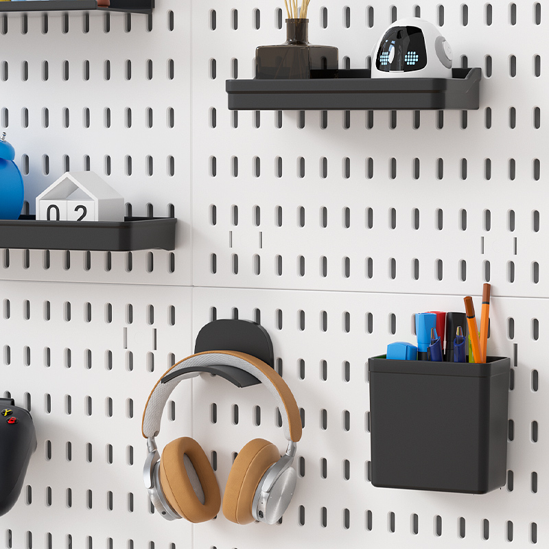 Wall - mounted pegboard for wall storage. Combine various accessories freely, and it doubles as an e - product display rack.