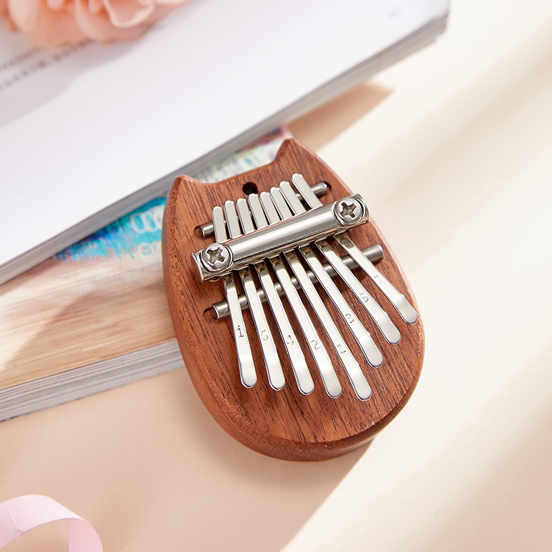 Mini Kalimba à 8 touches, piano à pouces, piano à doigts exquis, Marimba portable, pendentif musical, clavier à 8 touches: Argent